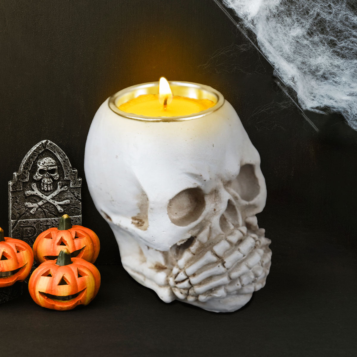 Portavela, Calavera con Manos en Boca