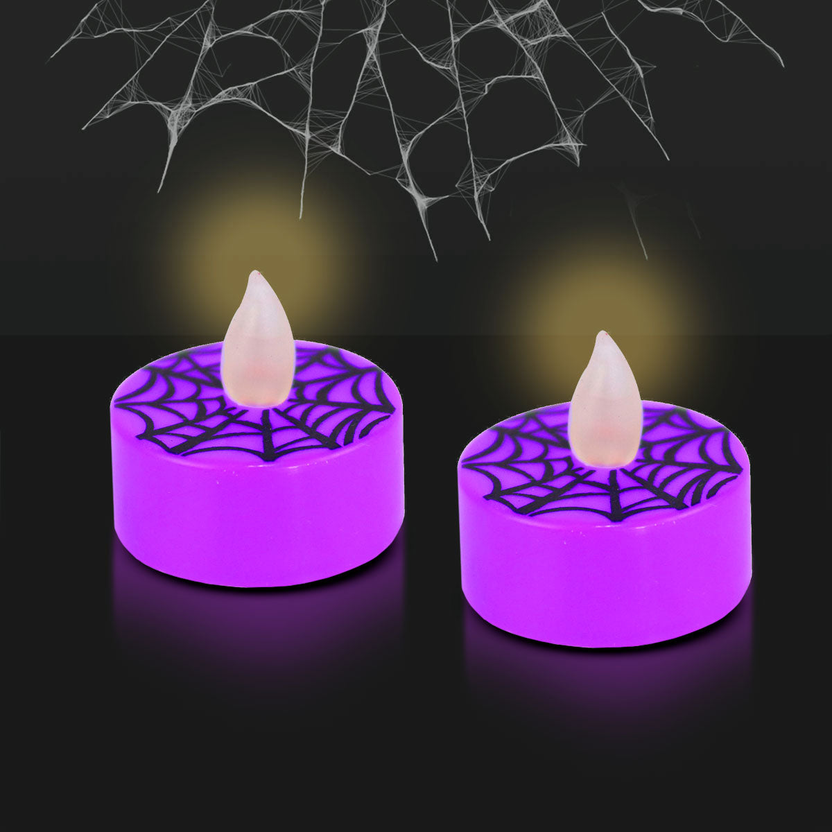 Set de 2 Velas color Morado con Estampado de Telaraña