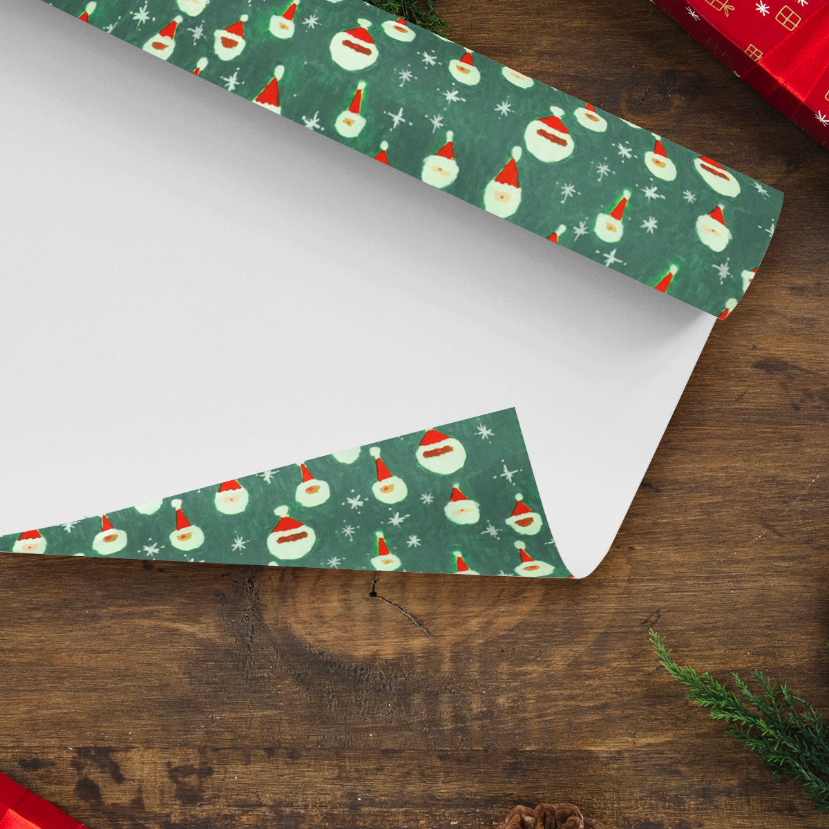 Papel de Regalo Navideño color Verde con Estampado de Santa Claus