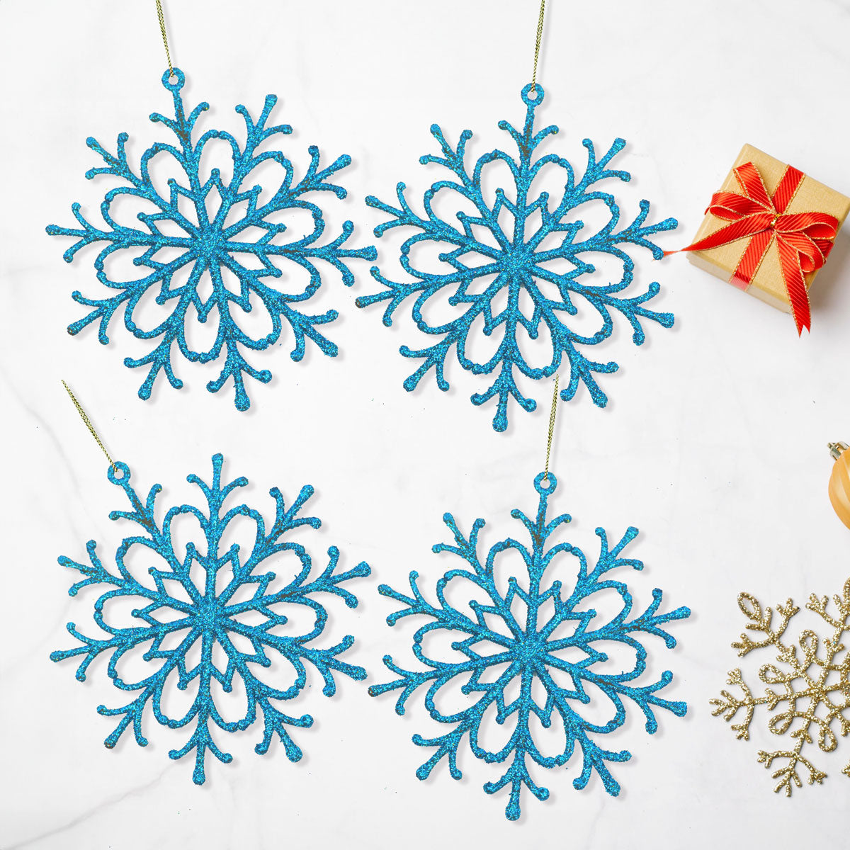 Set de 4 Copos de Nieve color Azul con Glitter