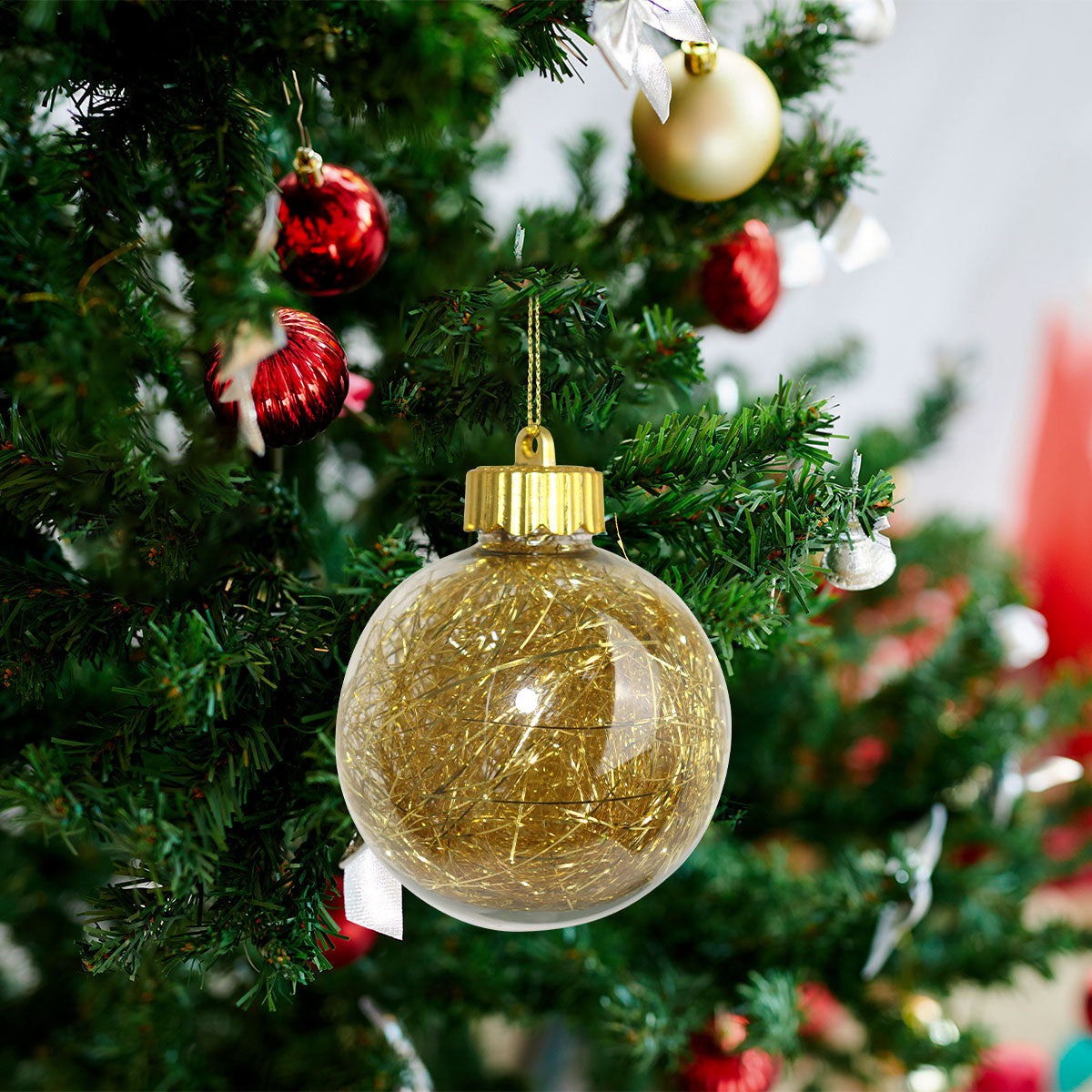 Esfera Navideña Transparente con Decoración color Oro