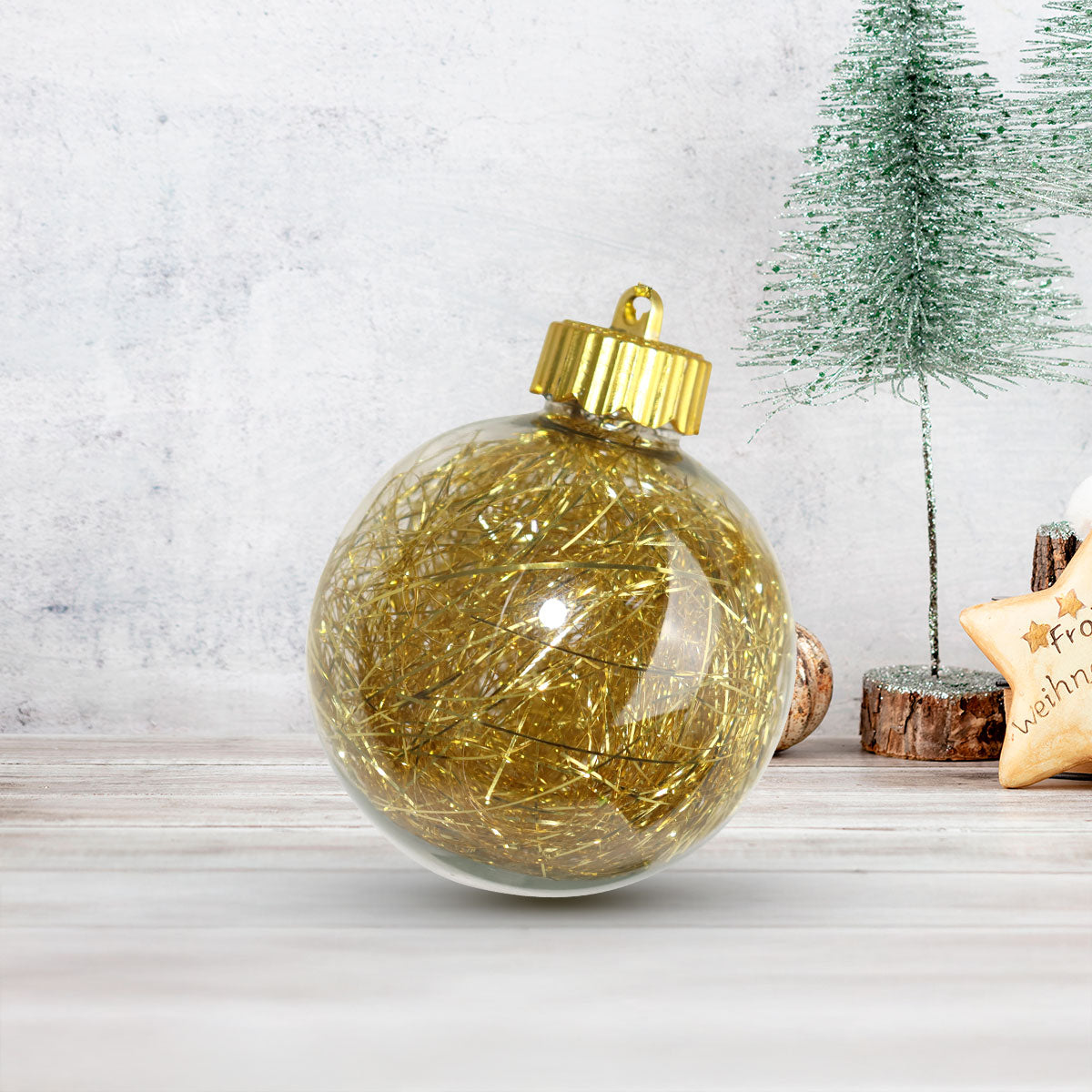 Esfera Navideña Transparente con Decoración color Oro
