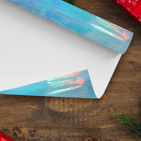 Papel de Regalo Navideño color Azul Iridiscente