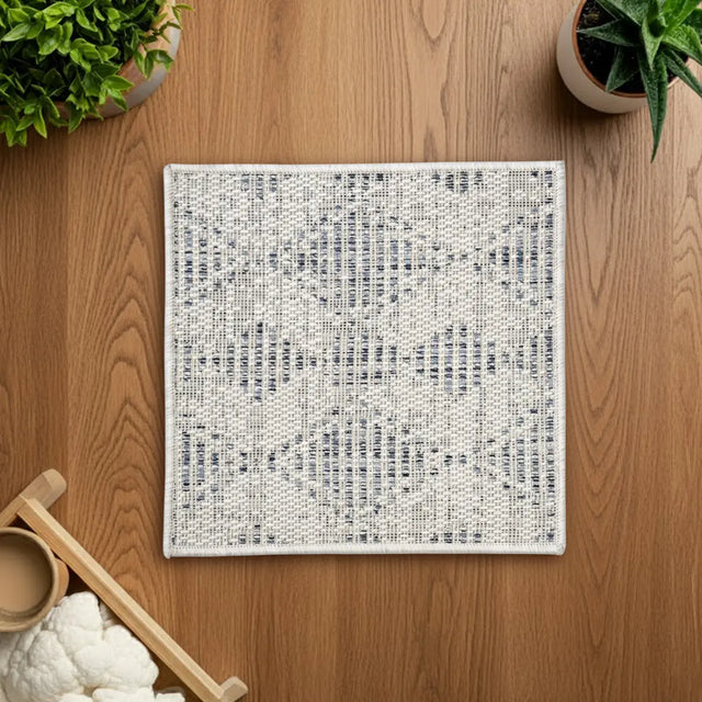 Tapete Cuadrado, Esencia