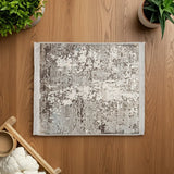 Tapete Cuadrado, Aura