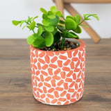 Maceta con Planta Artificial, Diseño con Patrón Figuras, Color Naranja